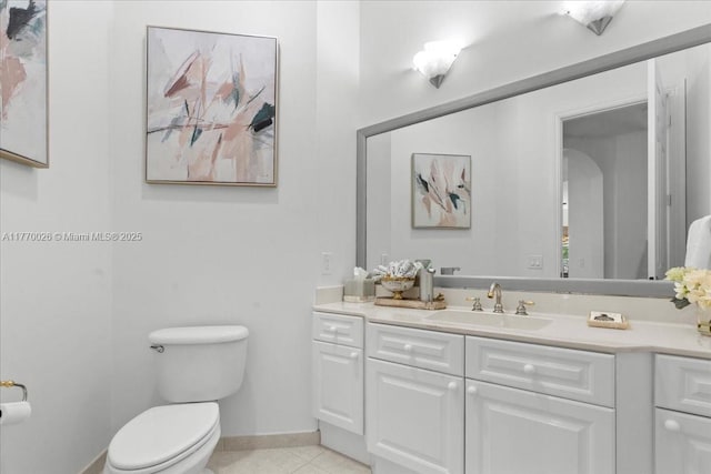 1427 Victoria Isle Dr, Weston, FL 33327 - bathroom featuring vanity, toilet, tile patterned floors, and baseboards