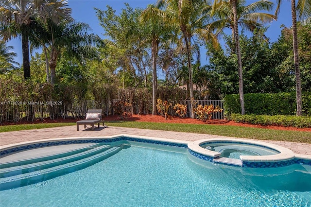 1427 Victoria Isle Dr, Weston, FL 33327 - view of pool featuring a pool with connected hot tub