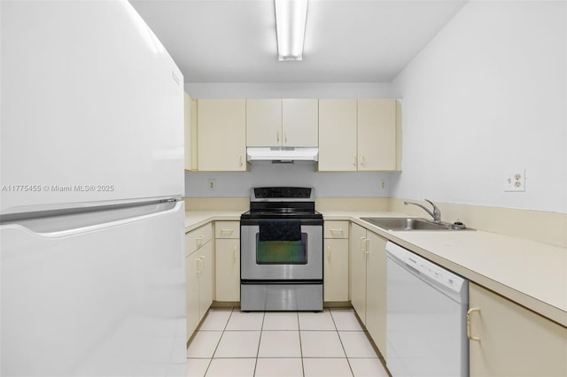 20747 SW 81st Pl Unit 20747, Cutler Bay, FL 33189 - kitchen featuring white appliances, cream cabinetry, under cabinet range hood, and a sink