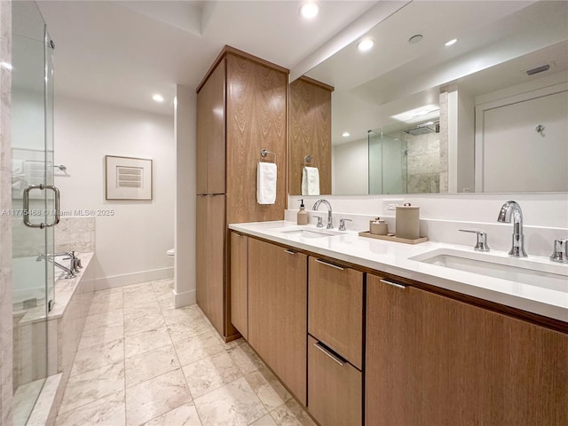 1331 Brickell Bay Dr Unit 506, Miami, FL 33131 - bathroom with double vanity, a stall shower, a bath, baseboards, and recessed lighting