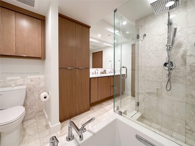 1331 Brickell Bay Dr Unit 506, Miami, FL 33131 - bathroom with a shower stall, vanity, a bath, toilet, and recessed lighting