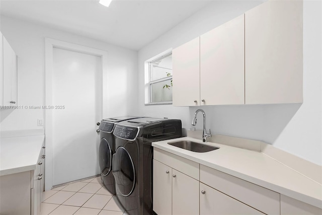 455 Centre Is, Golden Beach, FL 33160 - laundry room featuring a sink, light tile patterned floors, cabinet space, and independent washer and dryer