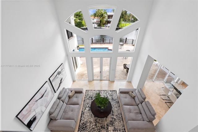 455 Centre Is, Golden Beach, FL 33160 - living area with a high ceiling and french doors