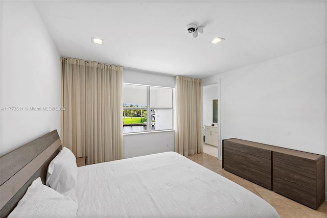 455 Centre Is, Golden Beach, FL 33160 - bedroom featuring light tile patterned floors and a water view