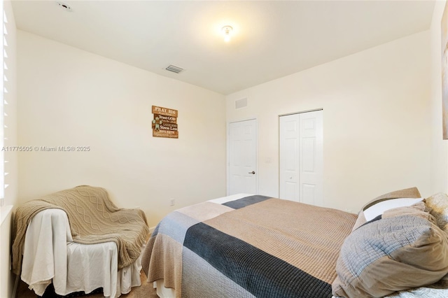 bedroom with visible vents