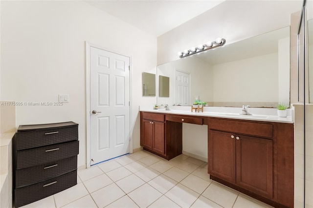 full bathroom with a sink, double vanity, and tile patterned floors