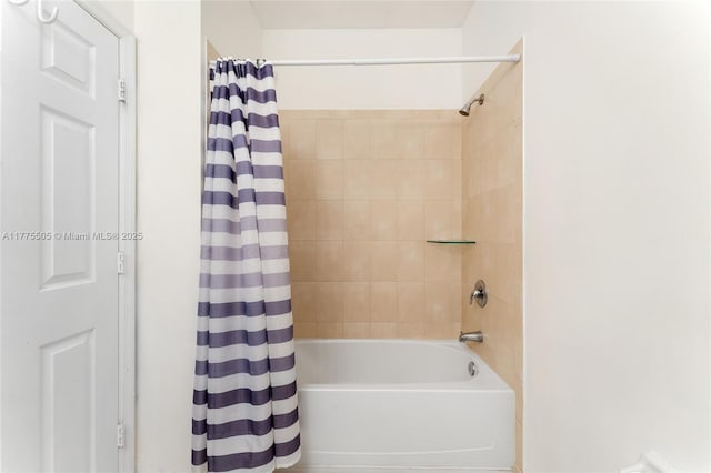 full bathroom featuring shower / bath combo with shower curtain