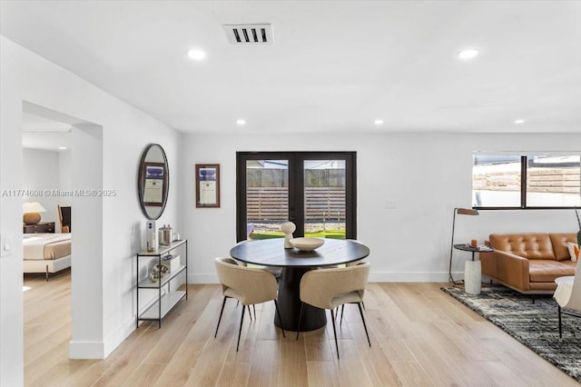 dining room with recessed lighting, visible vents, and a healthy amount of sunlight