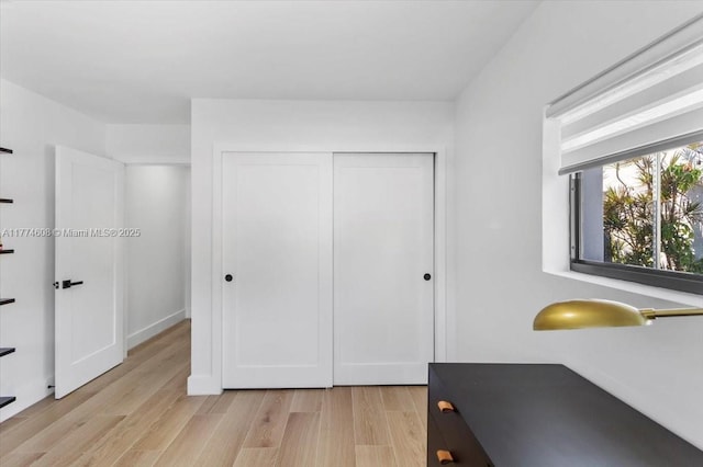office space with light wood-style floors