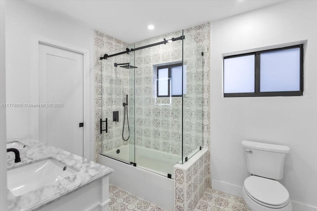 full bathroom featuring recessed lighting, tile patterned floors, combined bath / shower with glass door, toilet, and vanity