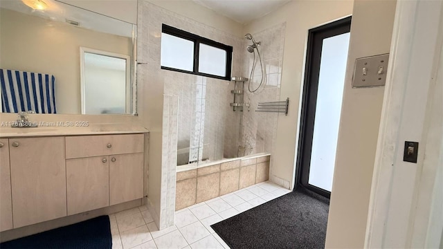 20785 SW 129th Ct, Miami, FL 33177 - bathroom featuring a tile shower, vanity, and tile patterned floors