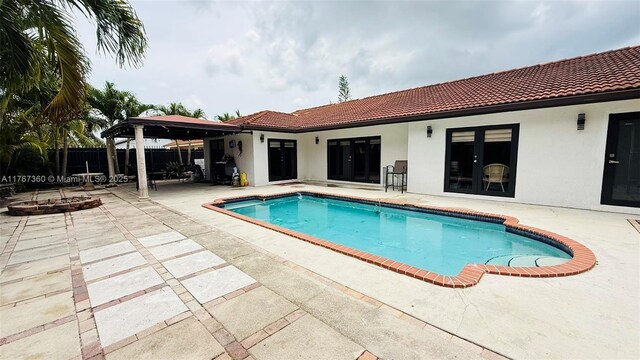 20785 SW 129th Ct, Miami, FL 33177 - view of pool with a patio area