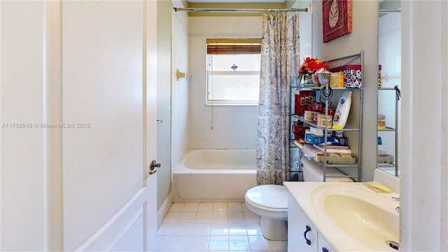 bathroom with toilet, tile patterned flooring, vanity, and shower / tub combo with curtain