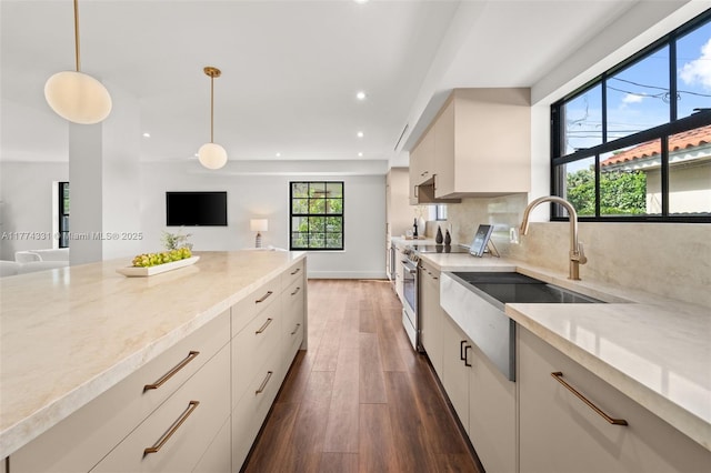 kitchen with recessed lighting, dark wood-style floors, pendant lighting, tasteful backsplash, and electric range