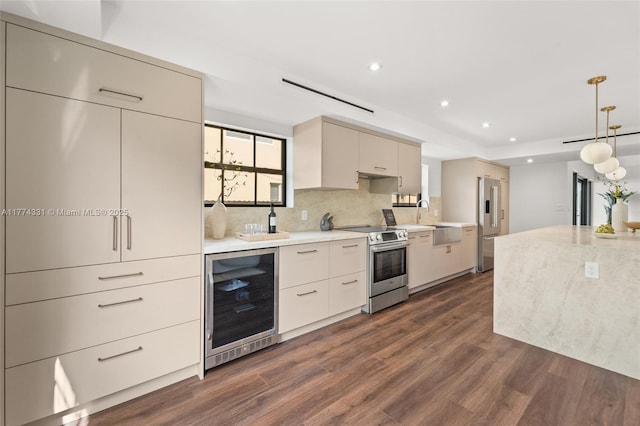 kitchen with recessed lighting, dark wood finished floors, stainless steel appliances, and wine cooler