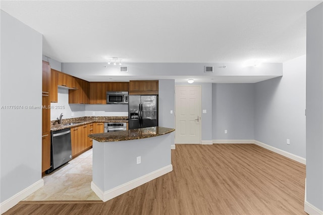 510 NW 84th Ave Unit 242, Plantation, FL 33324 - kitchen with stainless steel appliances, light wood-type flooring, and baseboards