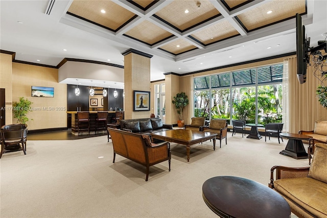community lobby with crown molding, coffered ceiling, and a towering ceiling