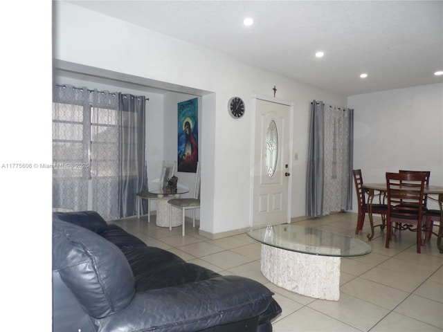 3491 Palm Ave, Hialeah, FL 33012 - living area featuring light tile patterned floors, recessed lighting, and baseboards