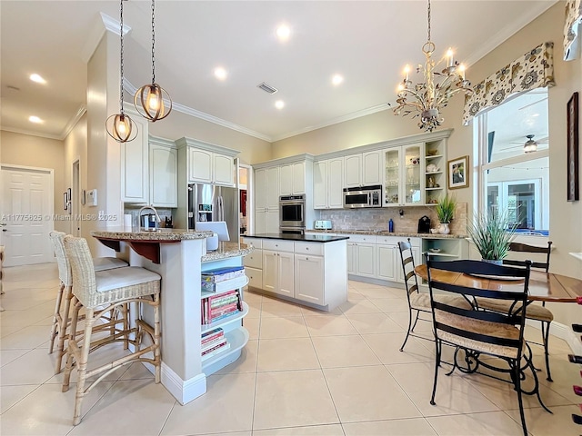 kitchen with open shelves, appliances with stainless steel finishes, a peninsula, tasteful backsplash, and light tile patterned floors