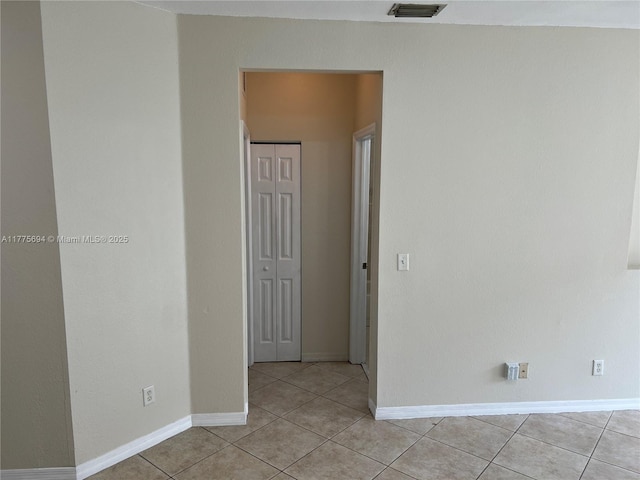 100 SW 15th Ave, Homestead, FL 33030 - spare room with light tile patterned flooring and baseboards