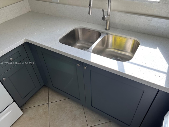 100 SW 15th Ave, Homestead, FL 33030 - kitchen view of a sink, light stone countertops, and gray cabinets