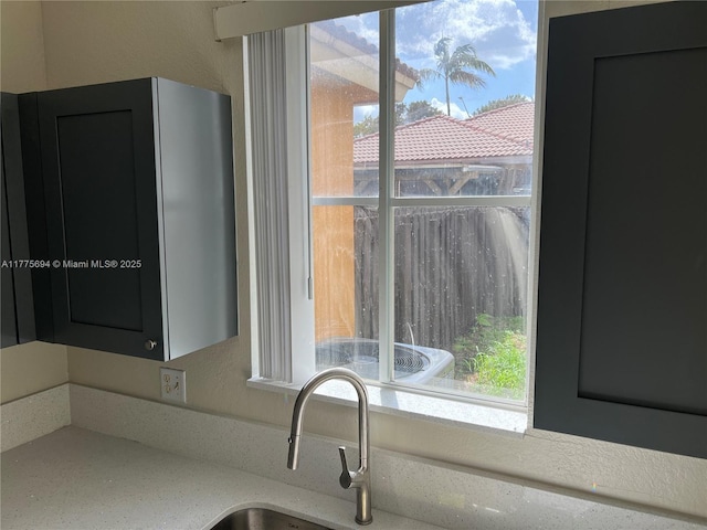 100 SW 15th Ave, Homestead, FL 33030 - kitchen view of a sink and light stone countertops