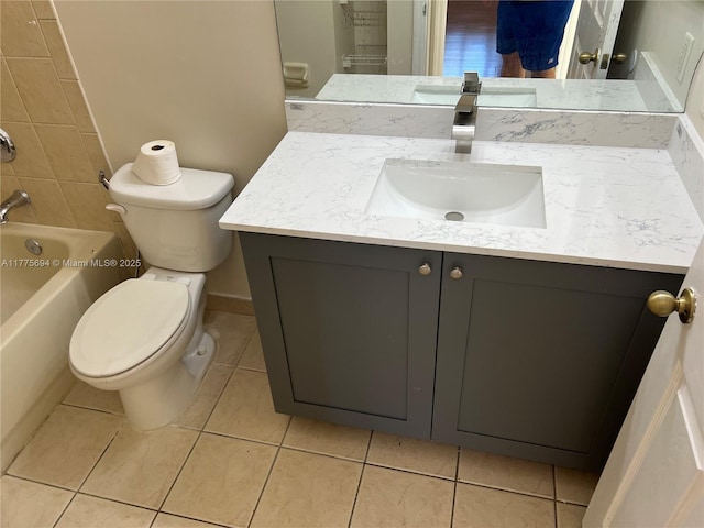 100 SW 15th Ave, Homestead, FL 33030 - full bath with tile patterned floors, toilet, vanity, and shower / bathtub combination
