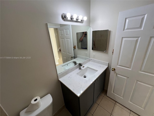 100 SW 15th Ave, Homestead, FL 33030 - bathroom with tile patterned floors, vanity, and toilet