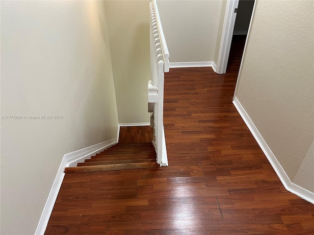 100 SW 15th Ave, Homestead, FL 33030 - stairway with wood finished floors, baseboards, and a textured wall
