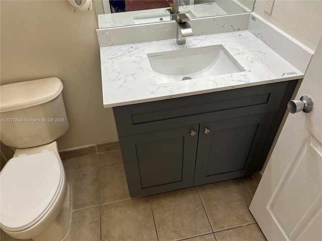 100 SW 15th Ave, Homestead, FL 33030 - bathroom featuring toilet, vanity, and tile patterned floors