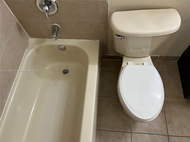 100 SW 15th Ave, Homestead, FL 33030 - full bathroom with toilet, a tub, and tile patterned flooring