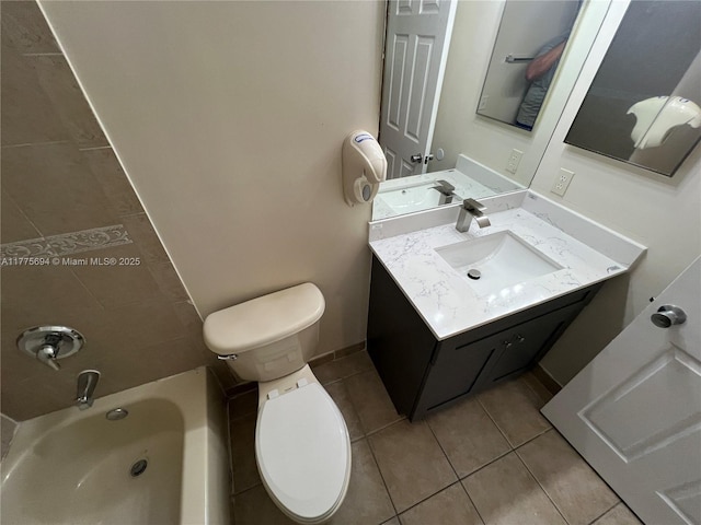 100 SW 15th Ave, Homestead, FL 33030 - bathroom featuring toilet, tile patterned flooring, vanity, and tub / shower combination