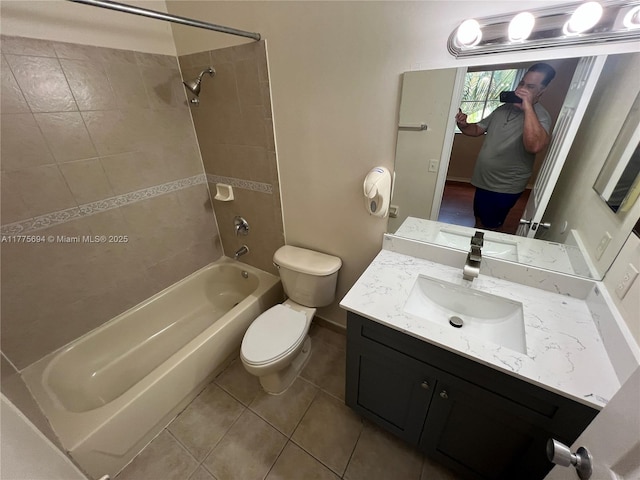 100 SW 15th Ave, Homestead, FL 33030 - bathroom featuring shower / bathtub combination, tile patterned floors, toilet, vanity, and baseboards