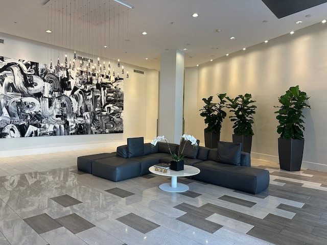 building lobby featuring visible vents