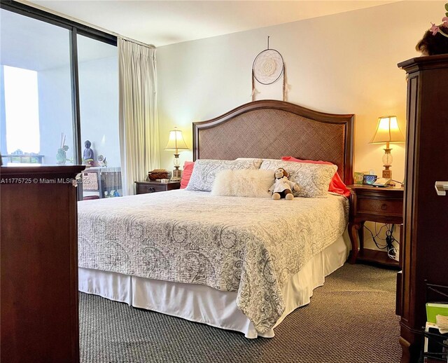 1901 Brickell Ave Unit B804, Miami, FL 33129 - carpeted bedroom featuring access to exterior