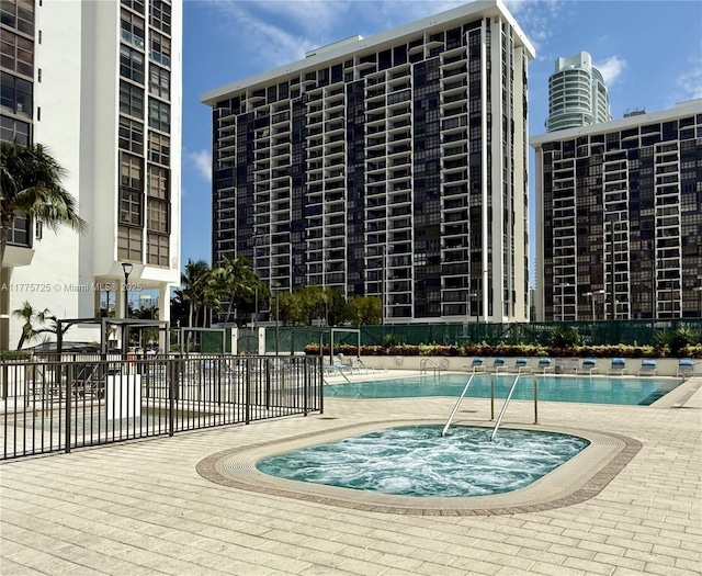 1901 Brickell Ave Unit B804, Miami, FL 33129 - community pool featuring a hot tub and fence