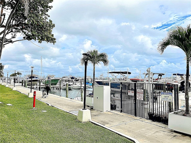 1901 Brickell Ave Unit B804, Miami, FL 33129 - view of dock featuring a lawn and a water view
