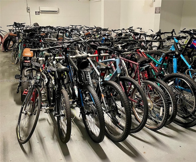 1901 Brickell Ave Unit B804, Miami, FL 33129 - garage featuring an AC wall unit and bike storage