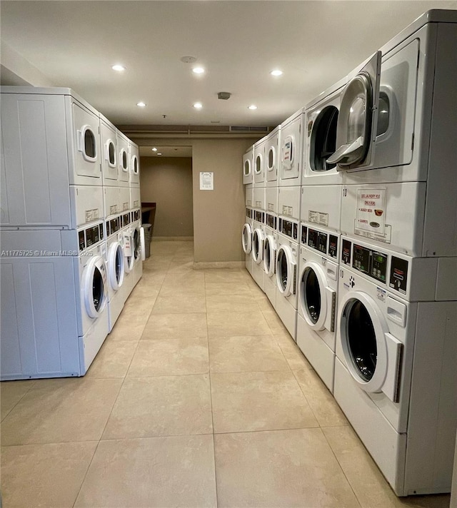 1901 Brickell Ave Unit B804, Miami, FL 33129 - shared laundry room featuring estacked washer and dryer, washer and clothes dryer, recessed lighting, and light tile patterned floors