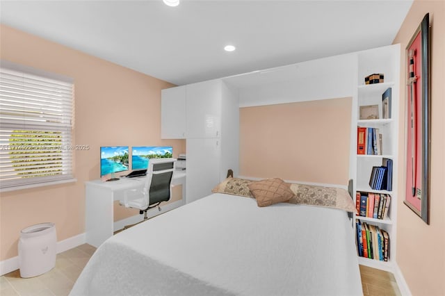 bedroom featuring light tile patterned floors, baseboards, and recessed lighting