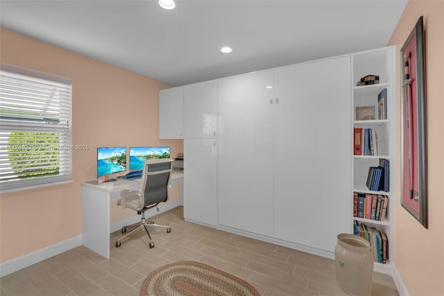 office space featuring baseboards and recessed lighting