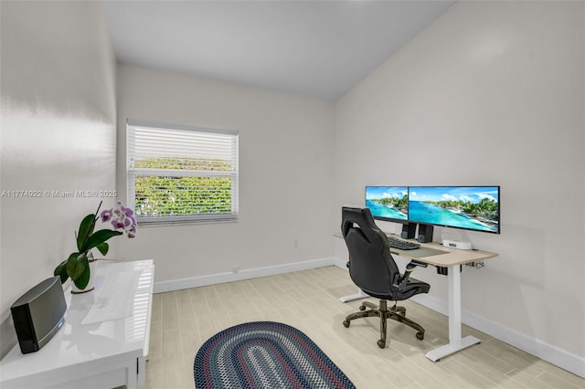 office space featuring wood tiled floors and baseboards