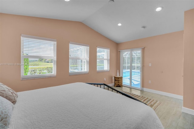 bedroom featuring access to exterior, lofted ceiling, light wood-style flooring, recessed lighting, and baseboards