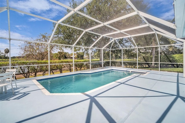 outdoor pool featuring a patio area
