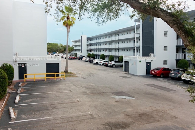447 NE 195th St Unit 217, Miami, FL 33179 - view of uncovered parking lot