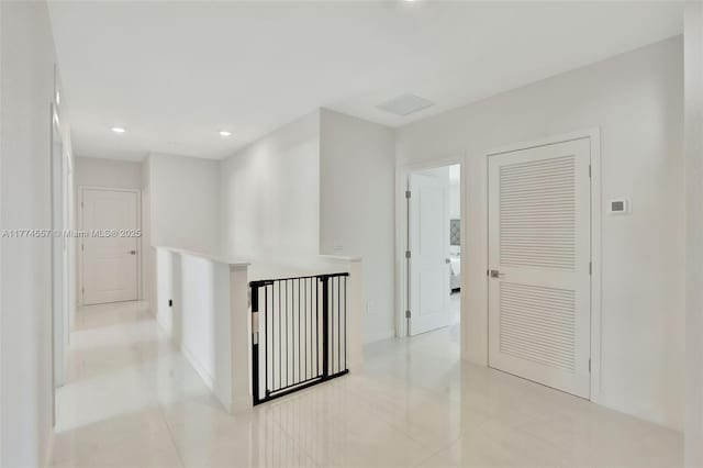 12973SW 266th Ter, Homestead, FL 33032 - hall featuring light tile patterned floors and recessed lighting