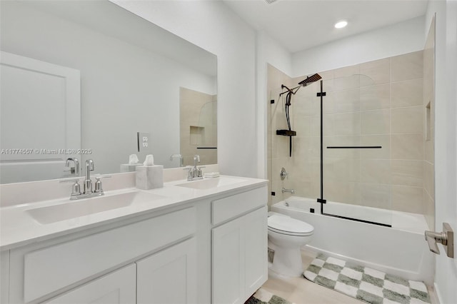 12973SW 266th Ter, Homestead, FL 33032 - bathroom with double vanity, bathtub / shower combination, toilet, tile patterned flooring, and recessed lighting