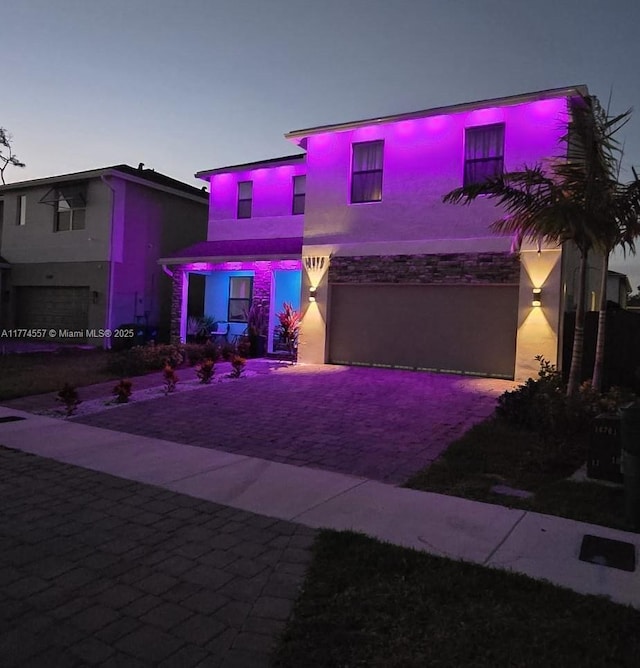 12973SW 266th Ter, Homestead, FL 33032 - view of front of house featuring stucco siding and decorative driveway