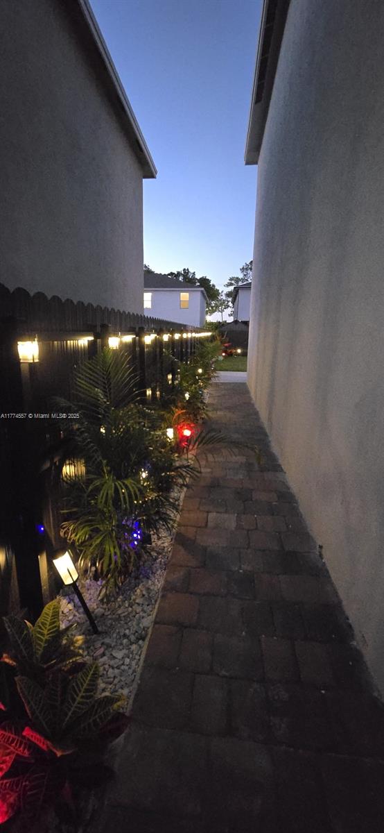 12973SW 266th Ter, Homestead, FL 33032 - view of side of property featuring stucco siding