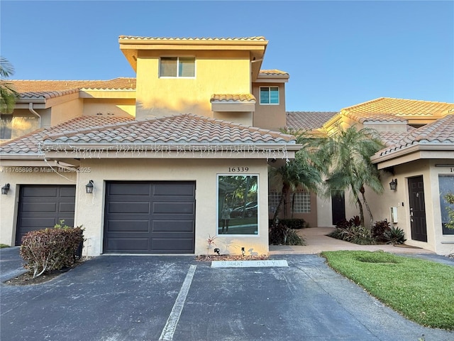 16339 Malibu Dr Unit 22, Weston, FL 33326 - view of front of property with stucco siding and a tile roof